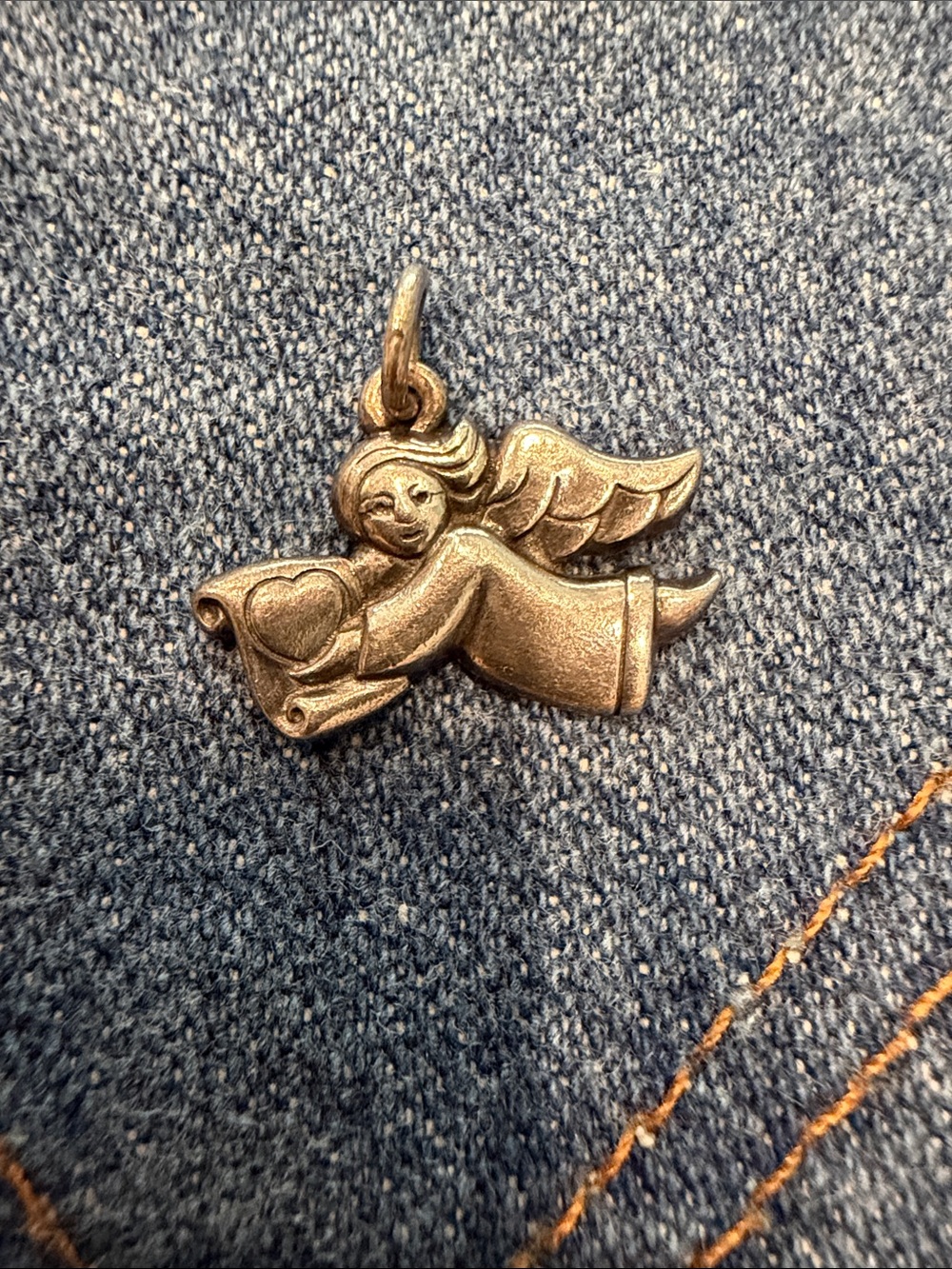 James Avery bearing love flying angel charm. Sterling silver. Retired